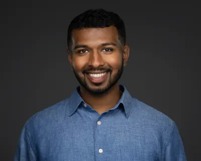 Professional headshot of Vignesh Mohankumar